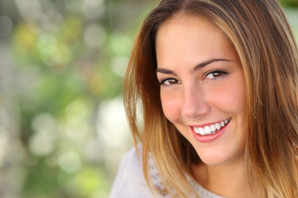 Beautiful woman with a whiten perfect smile - Teeth Whitening in Federal Way Beautiful woman with a whiten perfect smile - Teeth Whitening in Federal Way