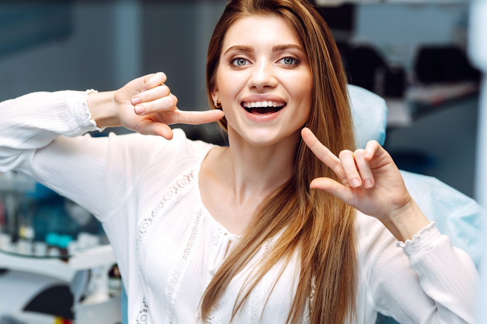 Young woman at the dentists chair - Porcelain Veneers in Federal Way Young woman at the dentists chair - Porcelain Veneers in Federal Way