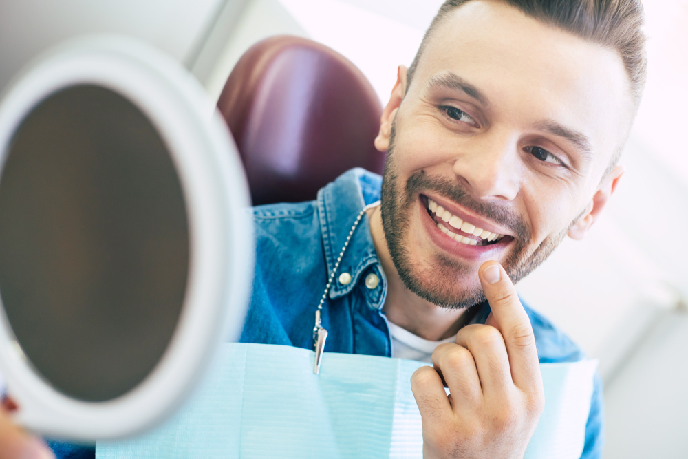 nice looking man with a perfect smile - Dental Crowns nice looking man with a perfect smile - Dental Crowns