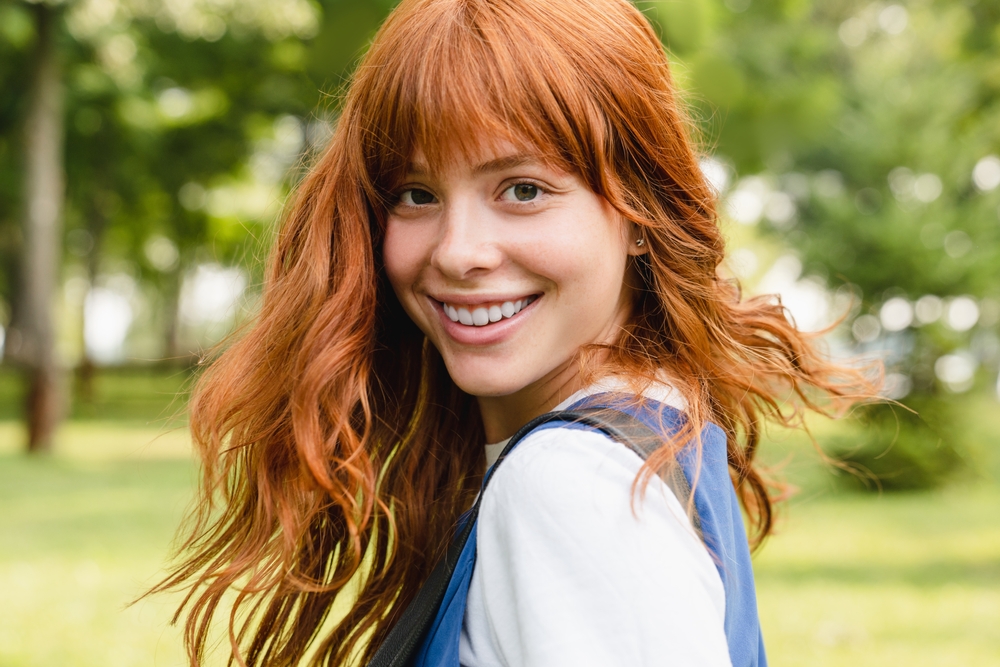 red hair smiling outdoors - Restorative Dentistry red hair smiling outdoors - Restorative Dentistry